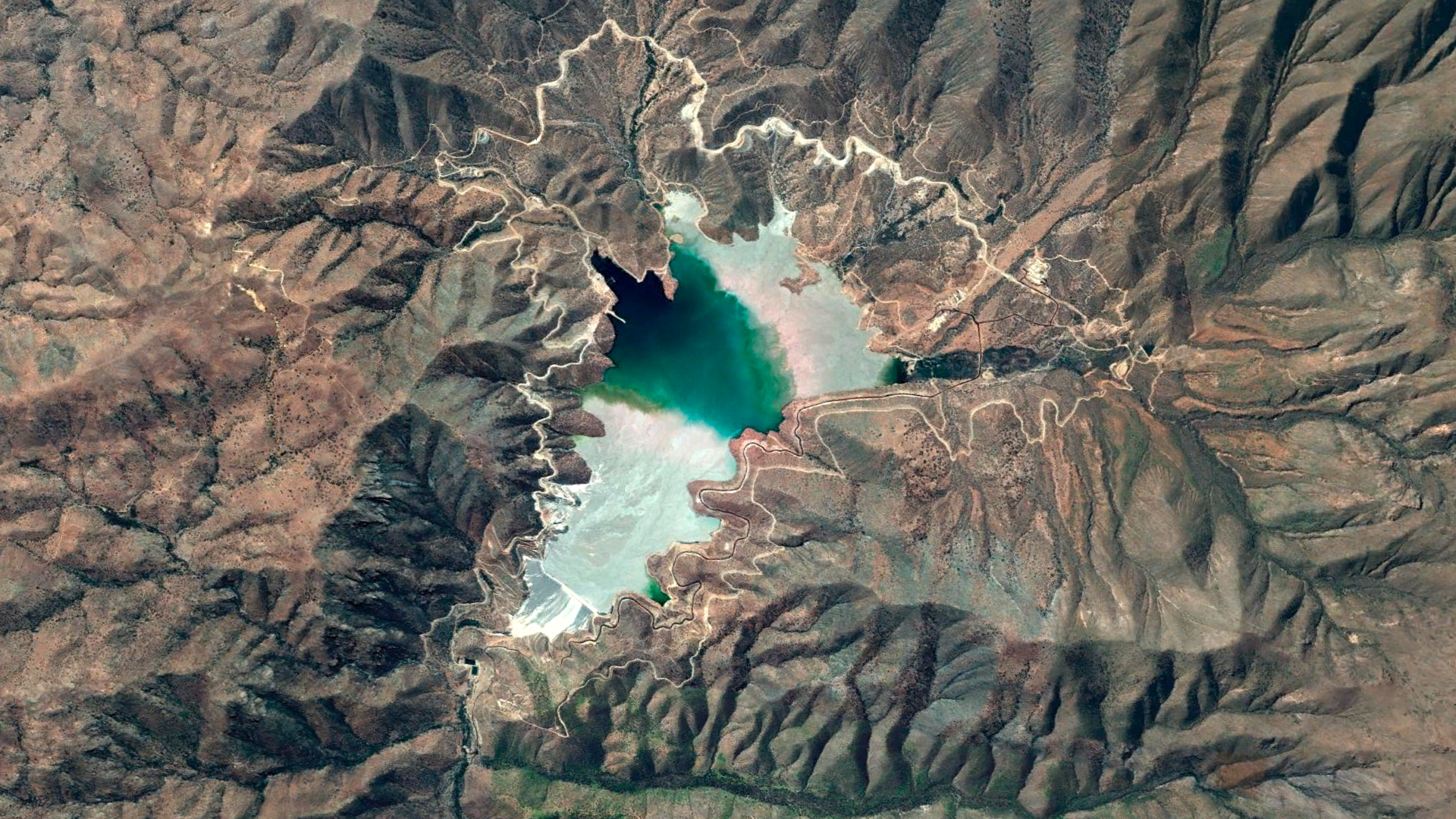 Google aerial view of El Mauro, Latin America's largest tailings and holding 2060 million tons of water and mining waste from Los Pelambres mine controlled by Antofagasta PLC 2020